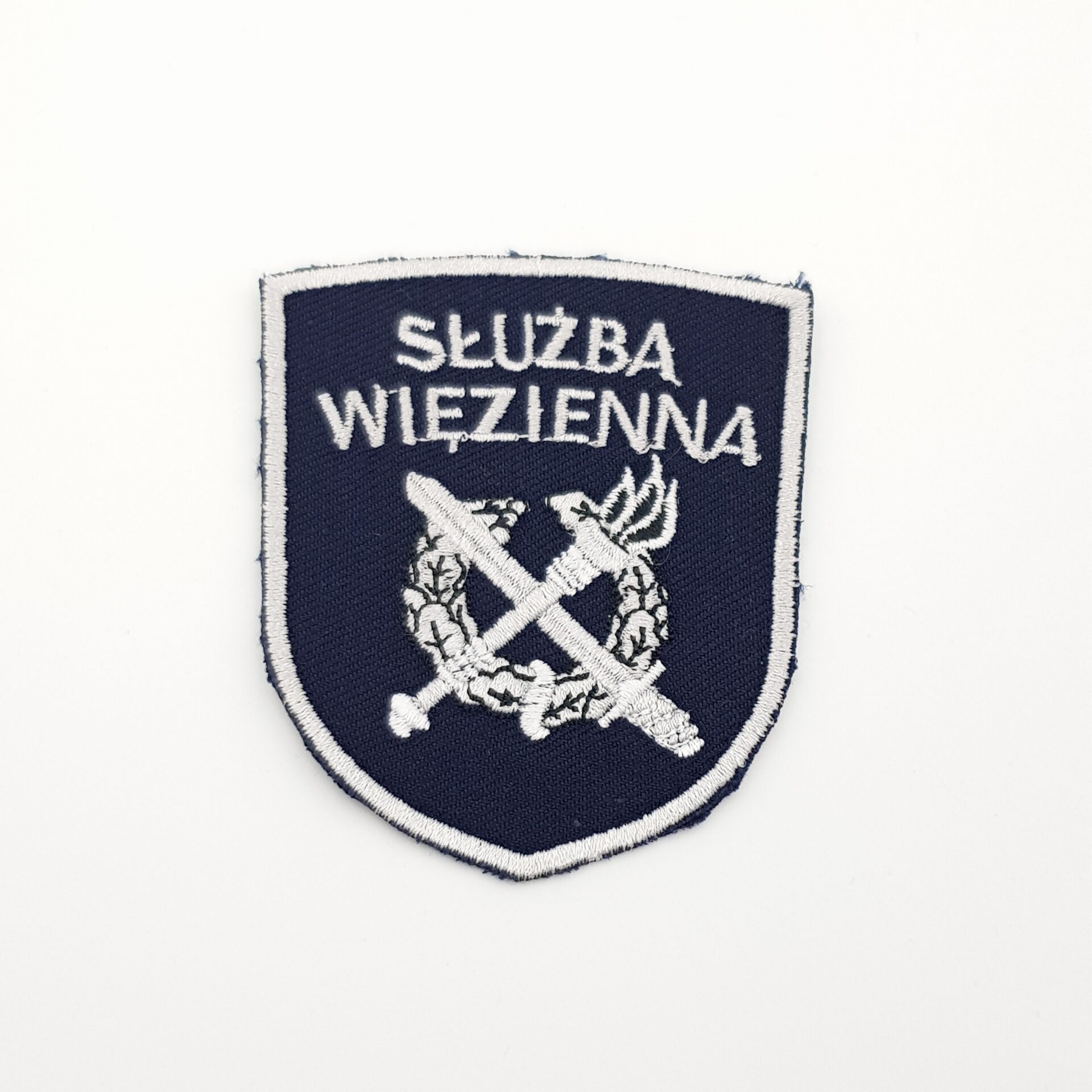 Oznaka służby w kształcie tarczy SW