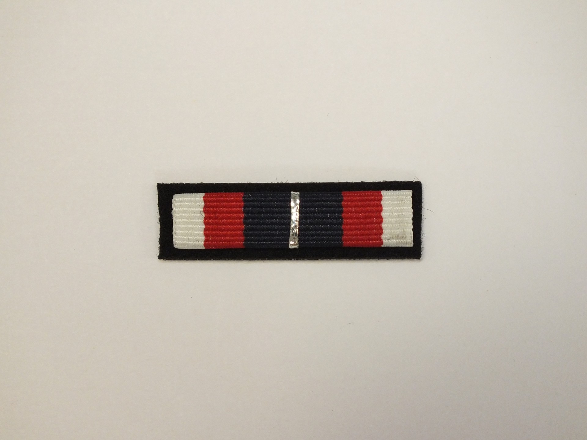 Baretka - Zasłużony Policjant brąz