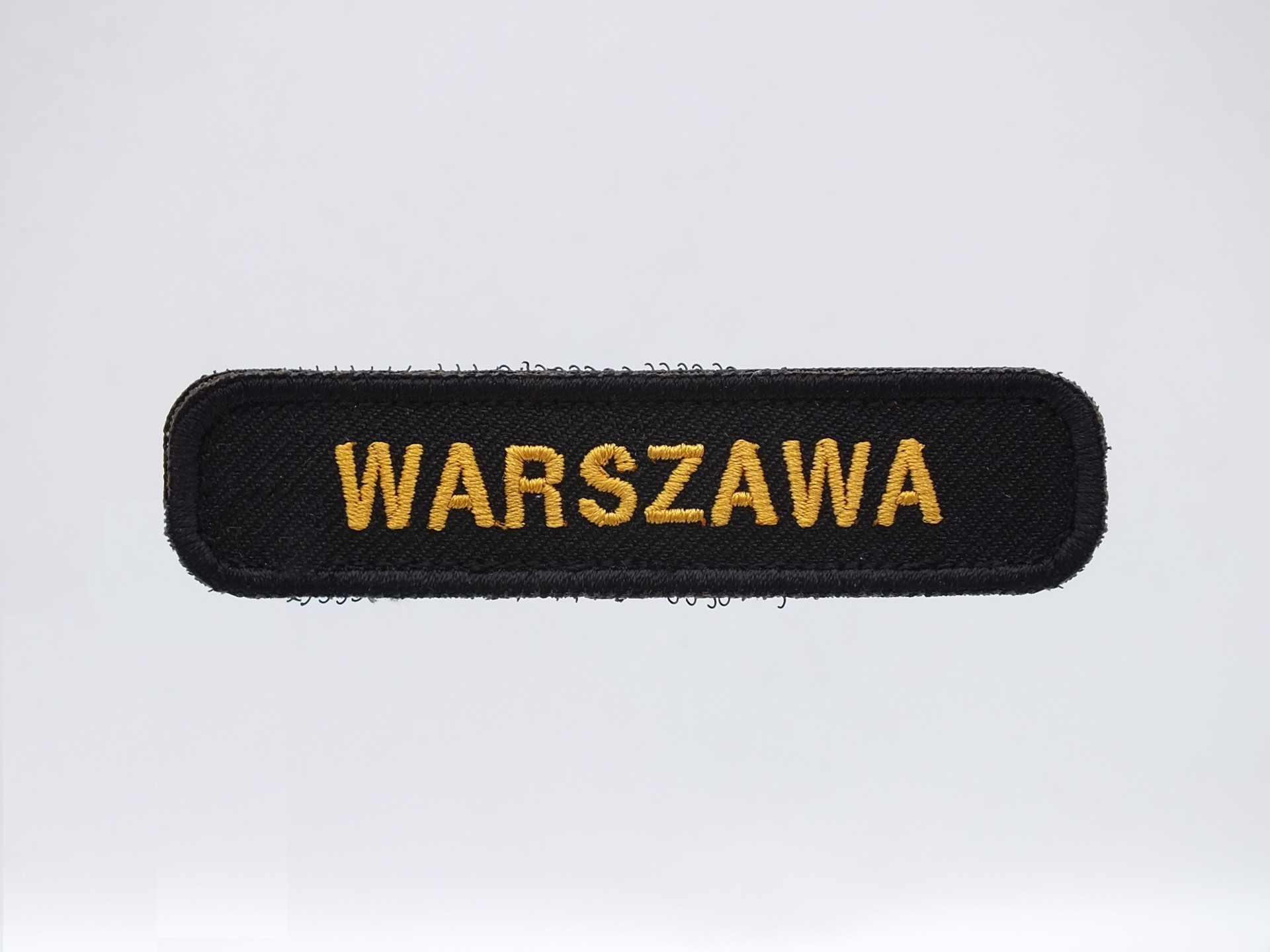 Emblemat z nazwą miasta PSP