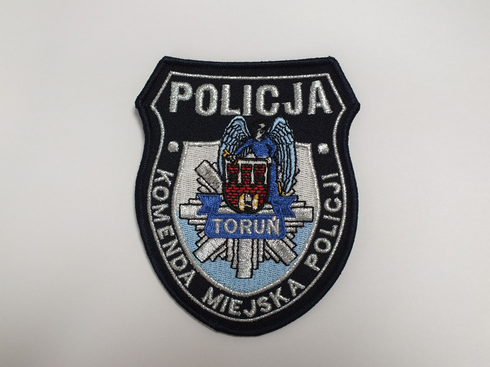Emblemat Policja - Komenda Miejska Policji Toruń